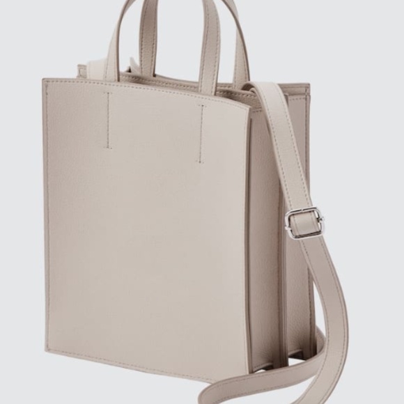 Uniqlo Handbags - UNIQLO NWT perfect divided mini tote bag natural, crossbody, sold out elsewhere